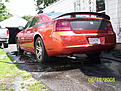 This is the 2006 Dodge Charger Daytona R/T limited edition in Go ManGo color. It has a badge on the glove box stating that it is car number 3675 of 4000. I like that.